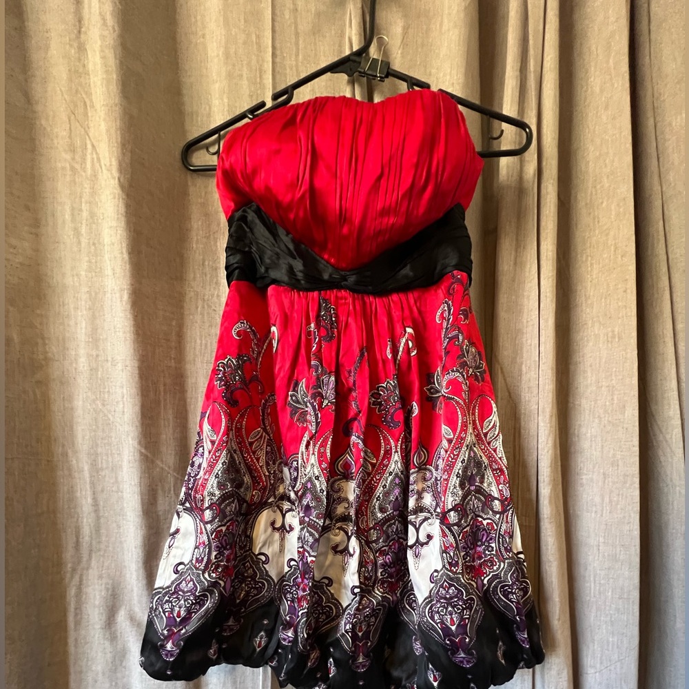 Wow!  Gorgeous and sexy short dress or under tights?  Strapless BEBE